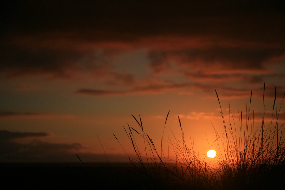 Nach einem schönen Tag auf dem Rennrad den Sonnuntergang genießen